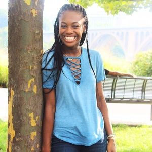 Light blue top with cross-string neckline